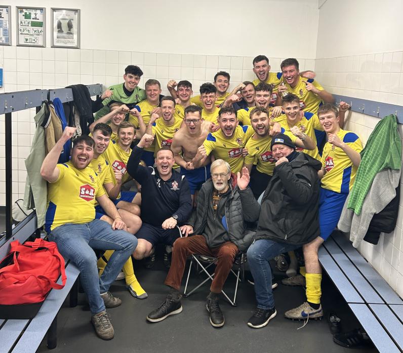 HAPPY CHRISTMAS: Manager Tommy Lowther, front left, groundsman Robert Furness and former manager Geoff Thwaites, front right, join in with the Barney team as they celebrate a 2-0 away win against Belmont United