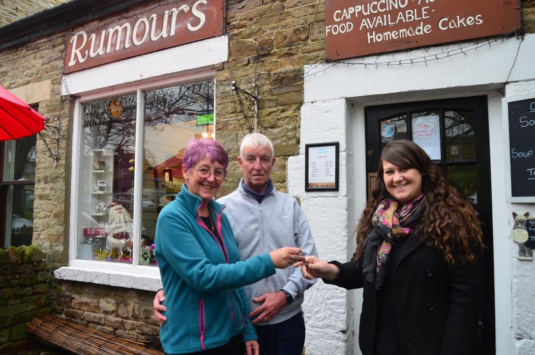 KEYS TO THE DOOR: Julie and Cliff Harthill hand over the keys to Rumours Café to new owner Kaylee Carter