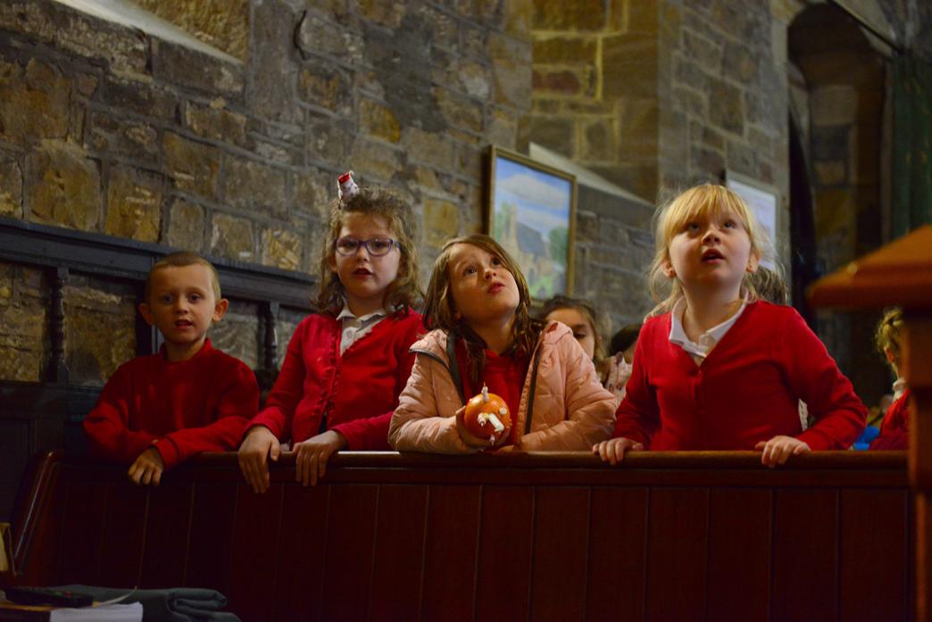 Harry Currie, Maisie Walker, Penny Watters and Emily Wilkinson enjoy singing Christmas carols