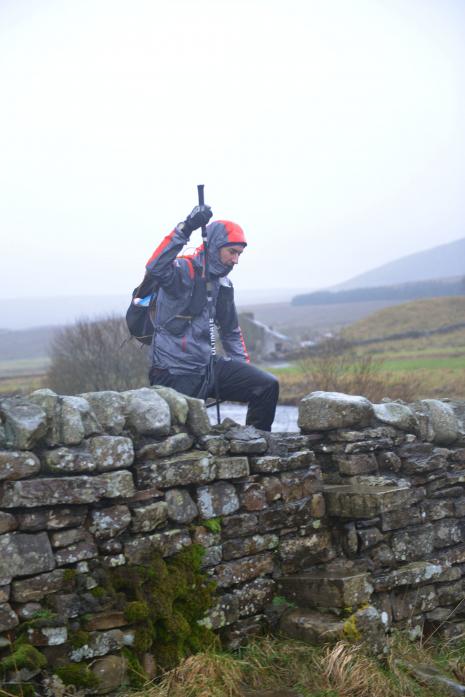 GRUELING RACE: Winner of the 2018 The Spine ultra-marathon Wouter Huitzing climbs over a stile at Forest-in-Teesdale 	             TM pic