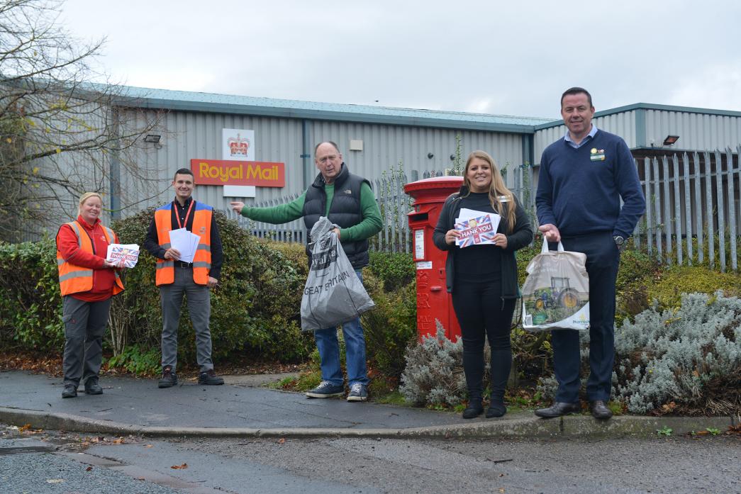 SPECIAL DELIVERY: Postie Laura Bromwich and delivery officer temporary manager Jamie Orpen, along with Morrisons supermarket manager Mark Walker and checkout team leader Sophie Butler, were thrilled to receive hundreds of thank you cards from Teesdale res