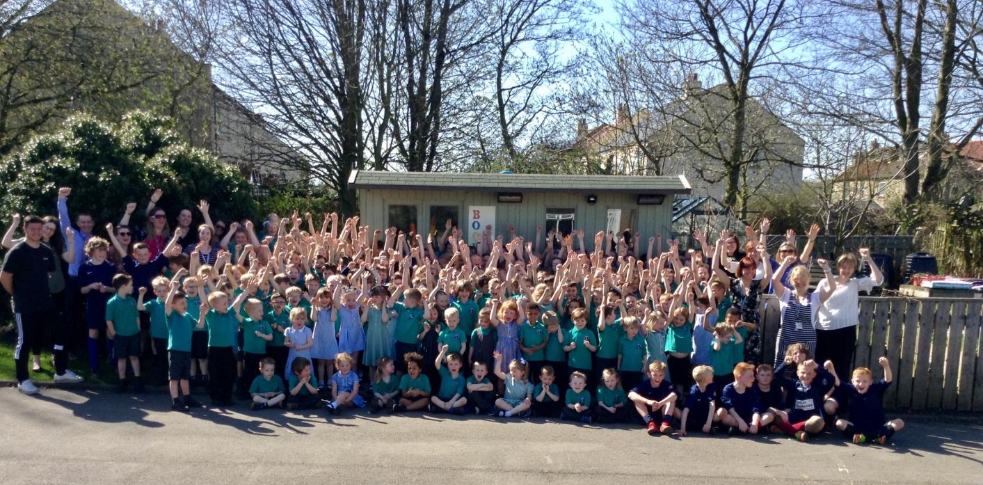 TOP MARKS: Pupils at Staindrop cheer their “fantastic” achievement