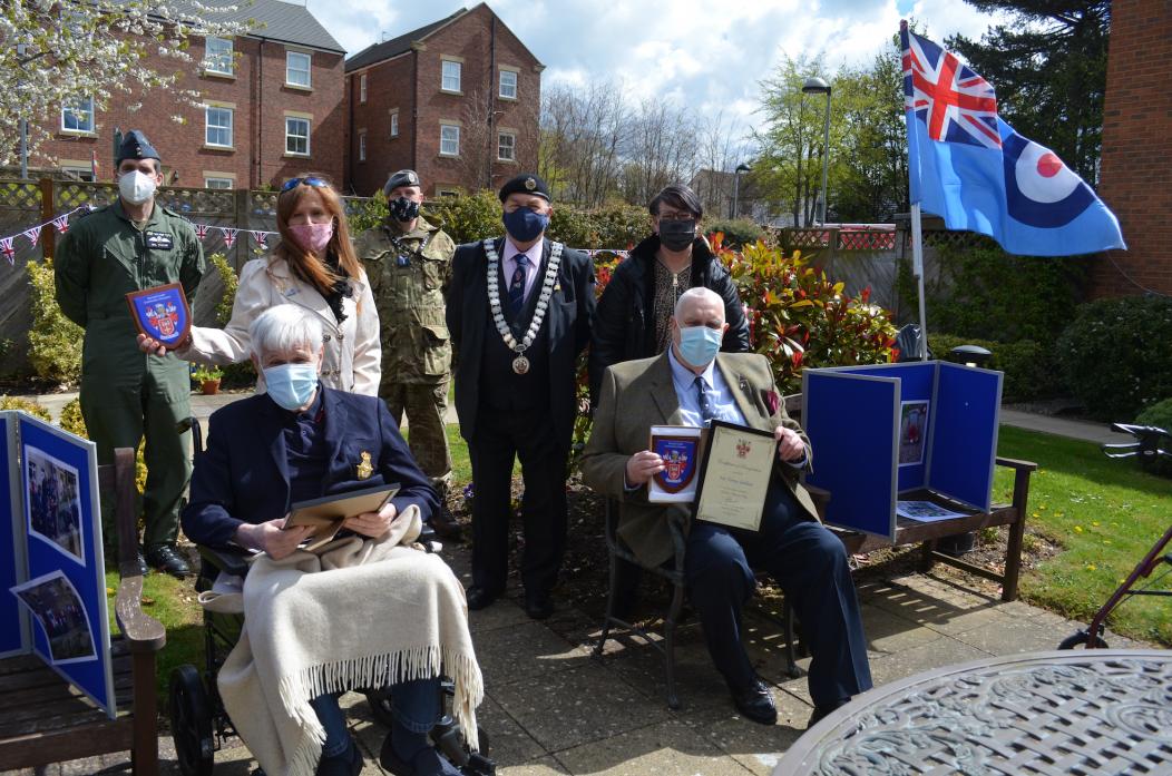 PERSONAL HONOUR: John Yarker, seated left with daughter Suzanne Thomas, and Tony Galley, seated right with daughter Claire Earl, received Civic Champion shields from Barnard Castle mayor Cllr John Blissett. They were joined by Sqn Ldr Neil Taylor and SAC