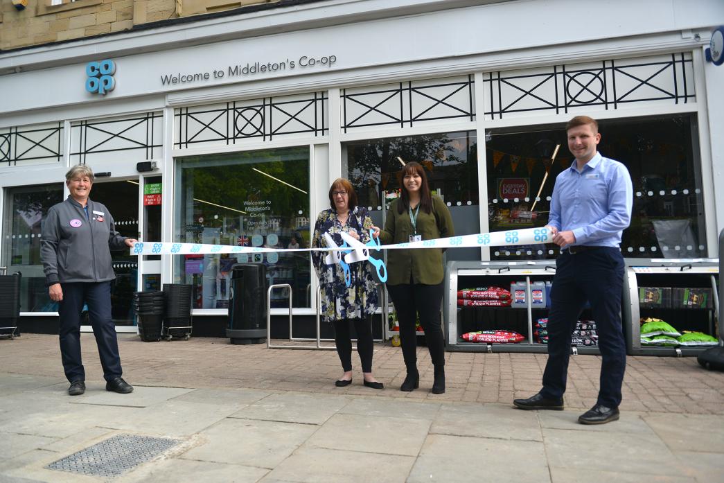 THANK YOU: Utass youth workers Gina Richardson and Jen Smurthwaite were invited to open the revamped Middleton-in-Teesdale Co-op in recognition of the community work they have done throughout the coronavirus pandemic. Holding up the ribbon are Co-op team