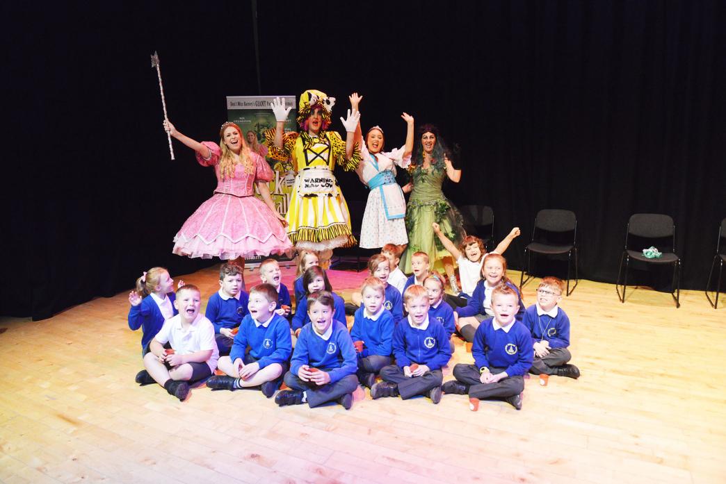 THAT’S ENTERTAINMENT: Green Lane Primary pupils with pantomime characters Fairy Peasblossom (Nik Grundison), Dame Trot (Phil Hoyles), Fairy Fleshcreep (Linda Newport) and Princess Jill (Eleanor Alderson)					   TM pic