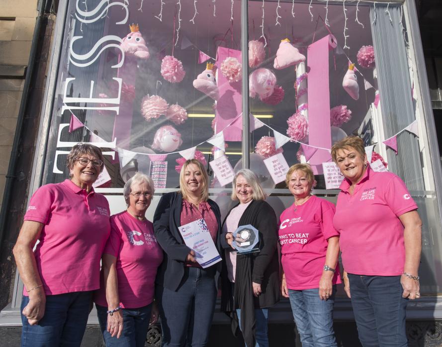 CANCER WINNERS: Emma Sutherst and Lynn Rochester, centre, with Gillian Harle, Mary Lambert, Pam Ashmore and Sue Warnes from the Teesdale branch of Cancer Research UK