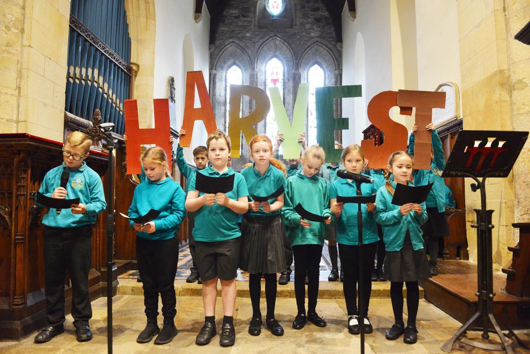 WHAT’S IN A WORD? Class Wear delivered a clever presentation about what harvest meant to them by re-arranging letters from the word harvest to create new words like eat, starve, rest and share