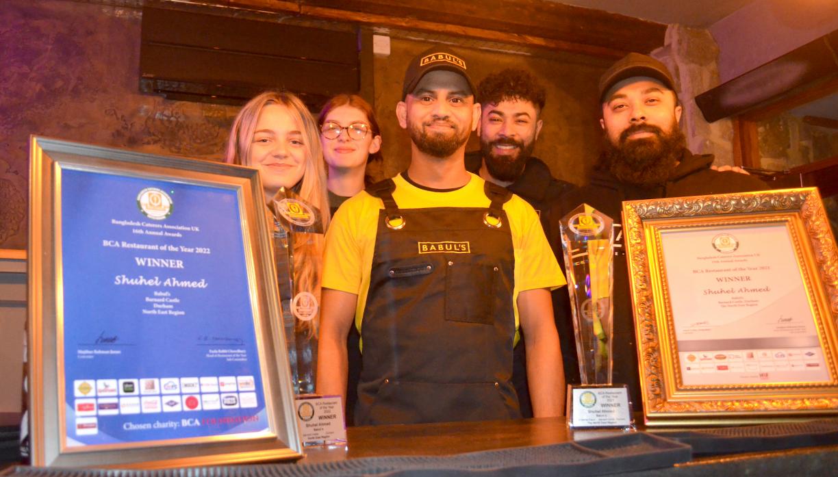 DOUBLE DELIGHT: Celebrating their second consecutive BCA award are, from left, May Hardy, Lucy Davis, chef Jay Islam and Babul’s owners Zak and Shuhel Ahmed