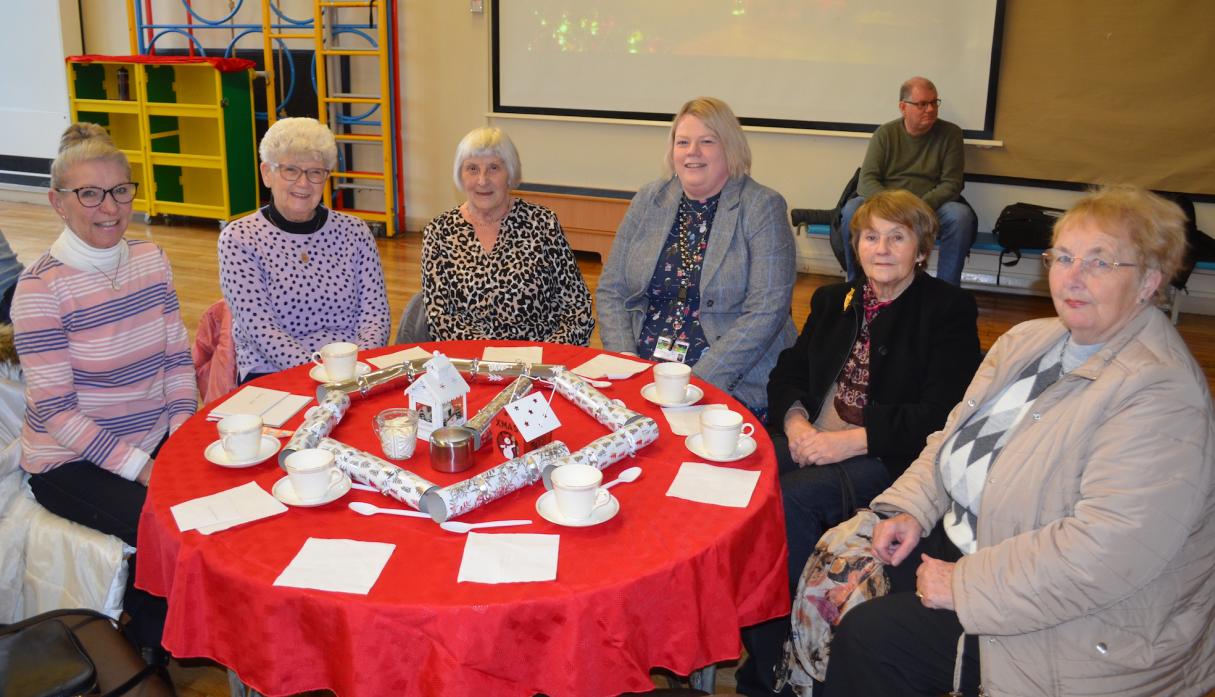 GREAT DAY: Above, head teacher Kathryn Costello, third right, chats to guests