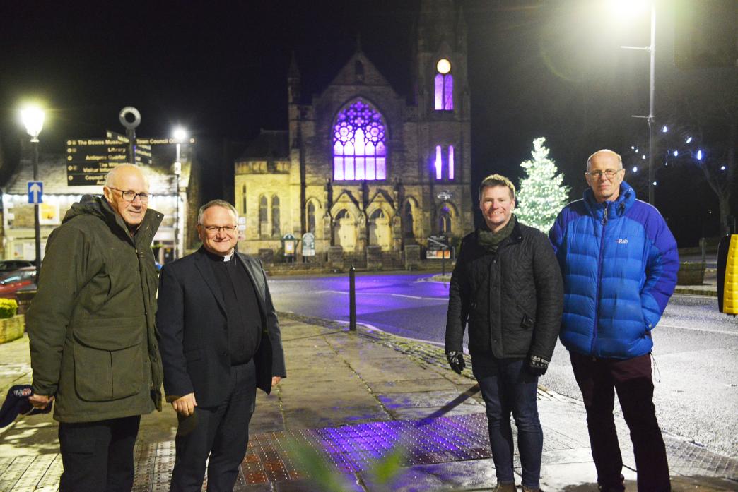 LIGHTS, ACTION: Tim Raw, Revd Graham Cutler, Jonathan Wallis and Roger Peat ensured Barnard Castle’s Methodist church became a centrepiece of the town’s Christmas lights display this year