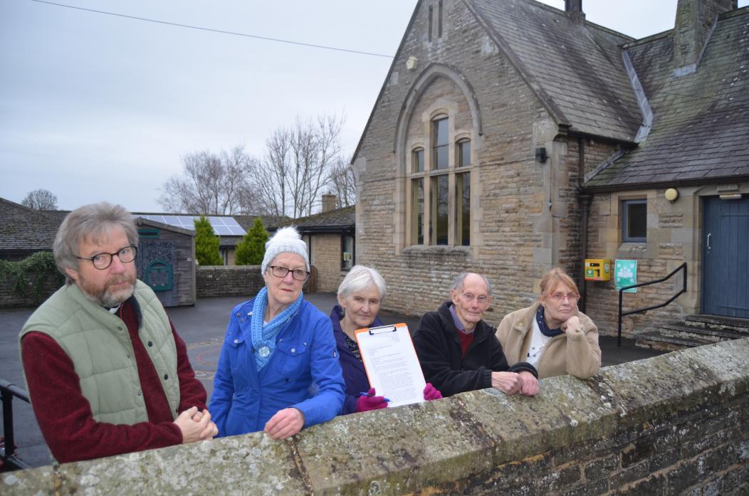 SAVE OUR CENTRE: Revd David Tomlinson with community centre volunteers Judith Rodwell, Maggie Rhodes and Colin Clarke and church warden Andrea Clarke