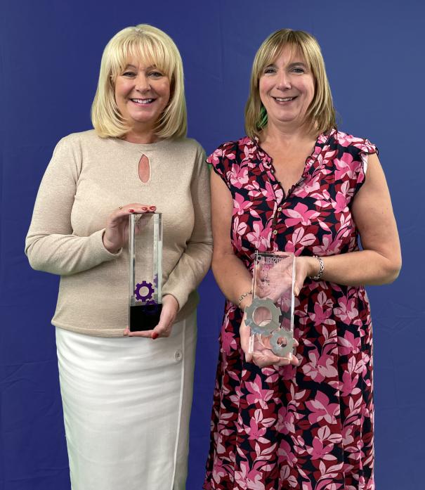 BUSINESS AWARDS: Gail Coll and Lynn Todhunter with two of the trophies