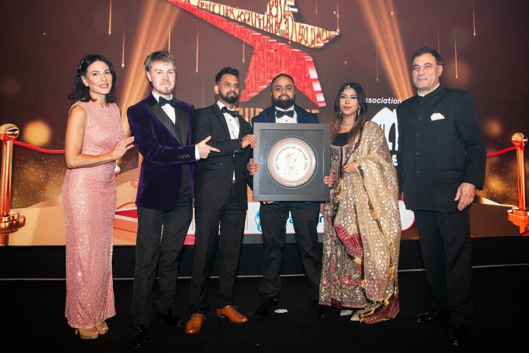 SPICE OF LIFE: Shuhel Ahmed accepts the best restaurant accolade on behalf of Babul’s during the Curry Life Awards