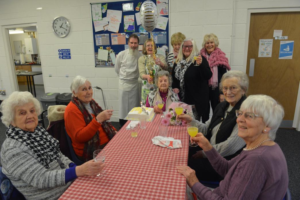 CHEERS: Annie Hutchinson, at the head of the table, celebrates her 100th birthday with friends at the Barnard Castle lunch club       TM pic