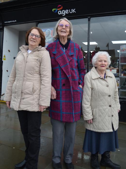 WRAPPING UP WARM: Age UK volunteers Yvonne Jones, Norma Earnshaw and Hilda Watson outside the Barnard Castle shop