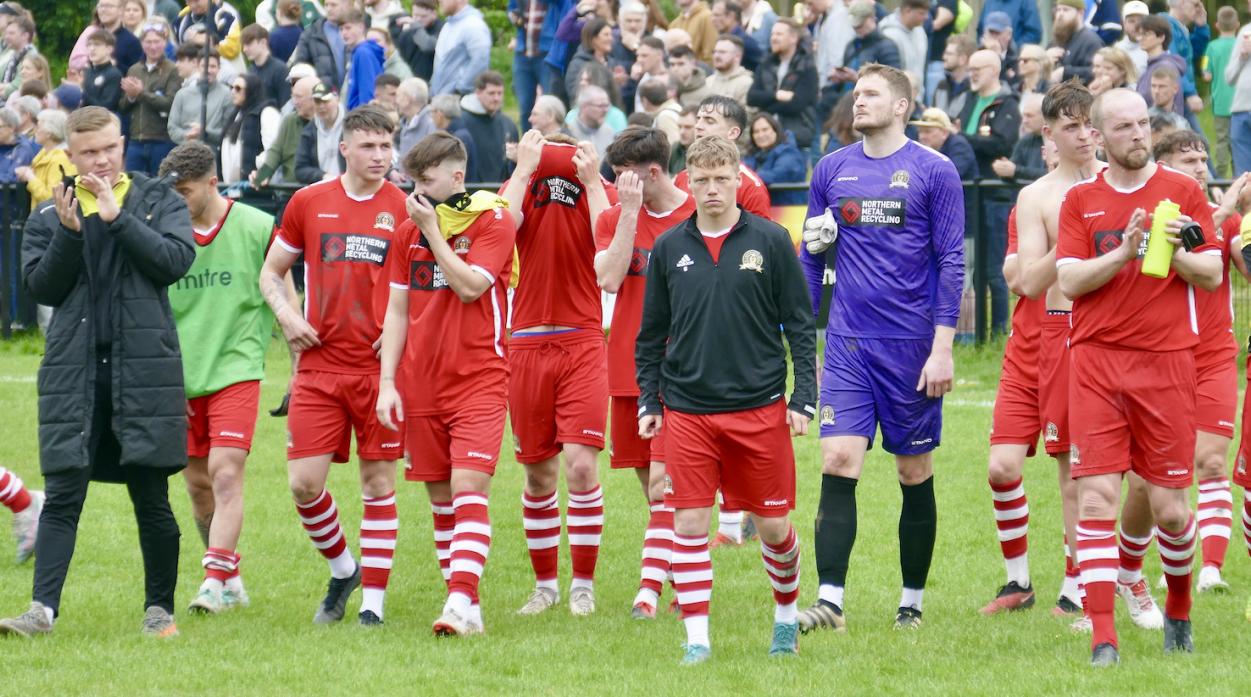 The devastated West players applaud their supporters