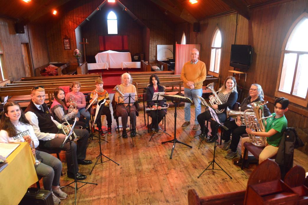 HIGH NOTES: Conductor Paul Krywyszym with members of Middleton-in-Teesdale and District Silver Band during a practice session at Woodland’s iconic tin church