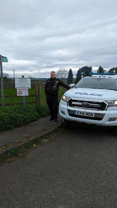 WARNING SIGN: PCSO Steve Richardson stands with the warning sign at Cockfield Fell