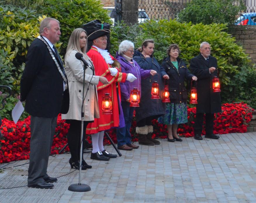 SHINING A LIGHT: Barnard Castle mayor Cllr Paul Ing and the civic party with the lanterns of peace.
