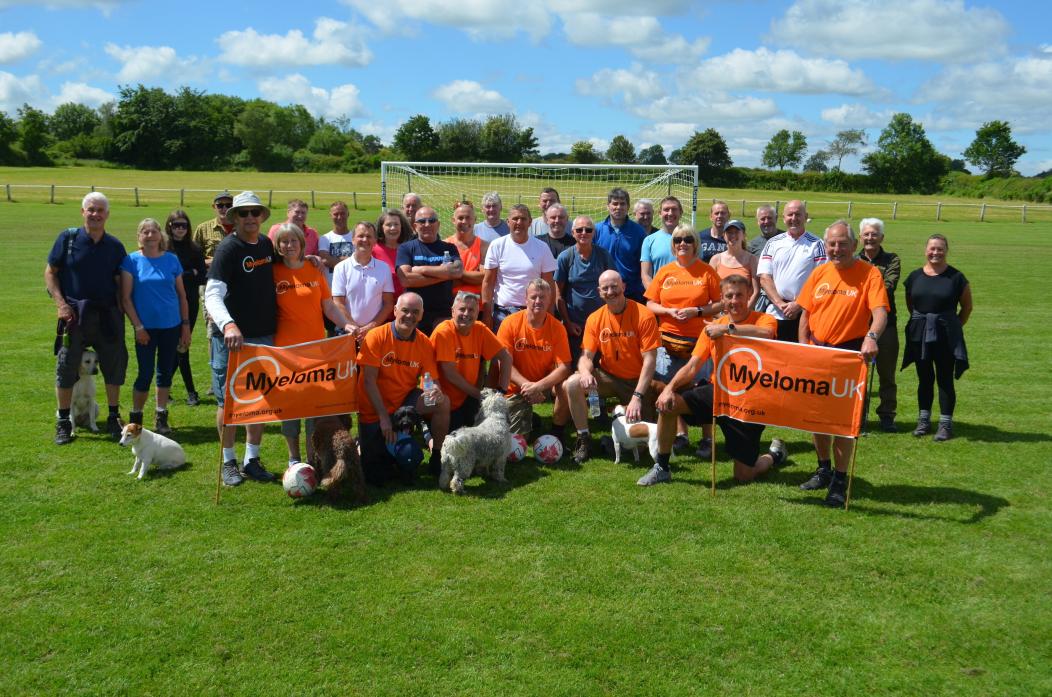 GREAT SUPPORT: Doug Wallis, front row left, with friends, footballers and supporters who turned out for his latest fundraising walk in aid of Myeloma UK											    TM pic