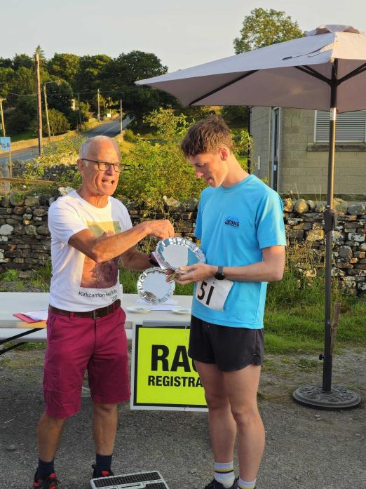 Will Carter receives his salver from Stuart Jones, race director. Both set new course records