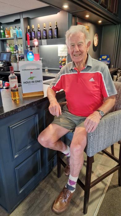 SPIRITED: Doug Bousfield celebrates with his congratulatory bottle of whisky at Barnard Castle Golf Club