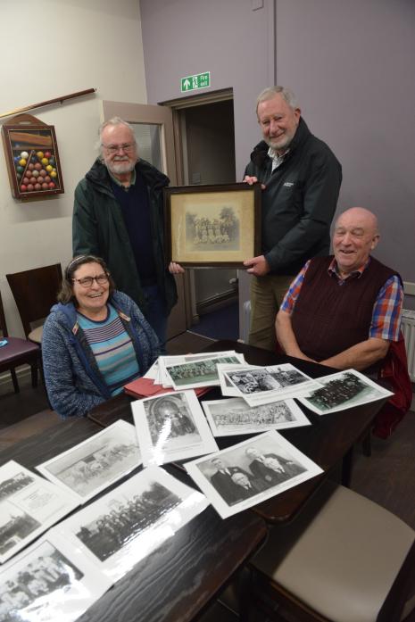 APPEALING FOR HELP: History trust members Jeanette Newell, David Wallace, Fred Atkins and Chris Mills are hoping visitors to their exhibition will be able to identify people in many of their archive photographs  			    TM pic