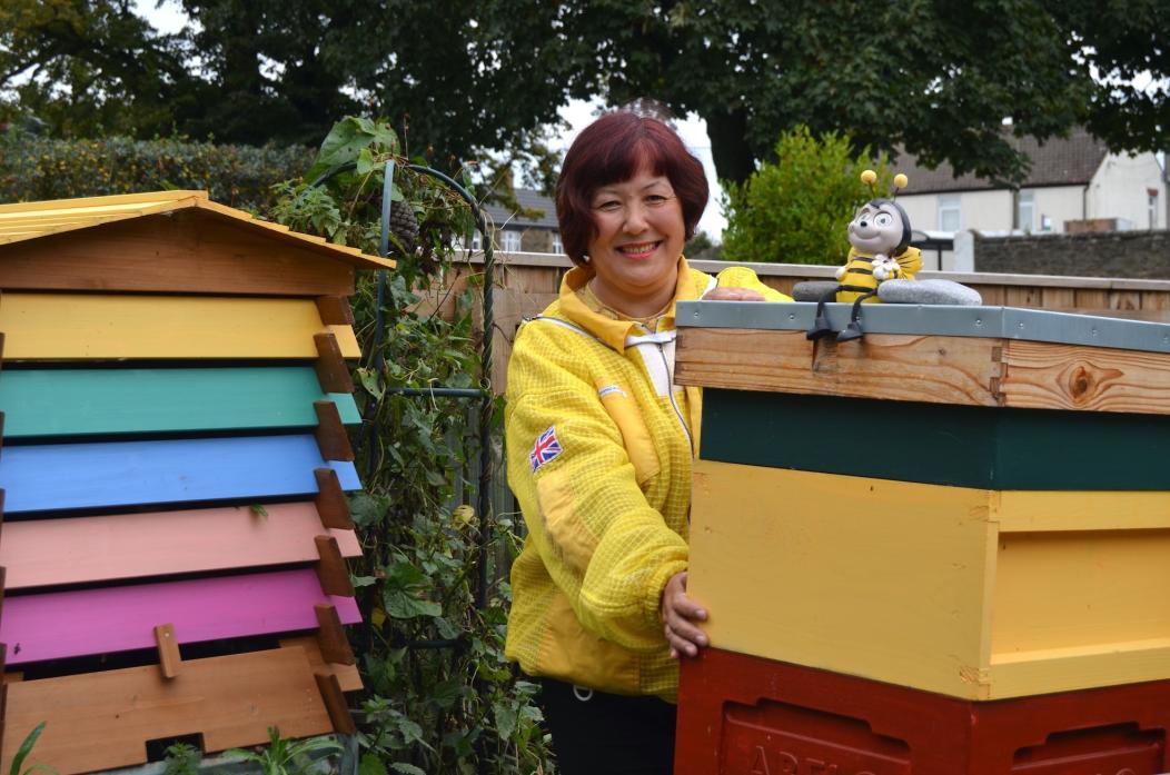 BEE FRIENDLY: Dina Salenova is leading the charge to save the world’s bee population, one hive at a time		    TM pic