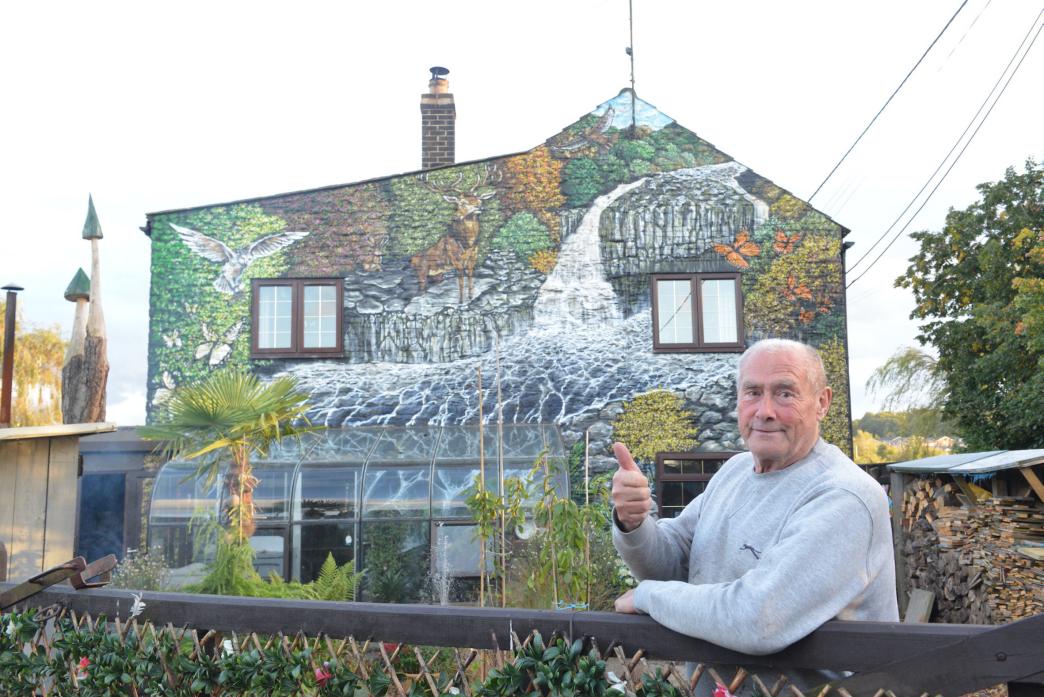 UNIQUE: Kevin Smith has installed a water feature at the base of the High Force mural on the gable end of his house.