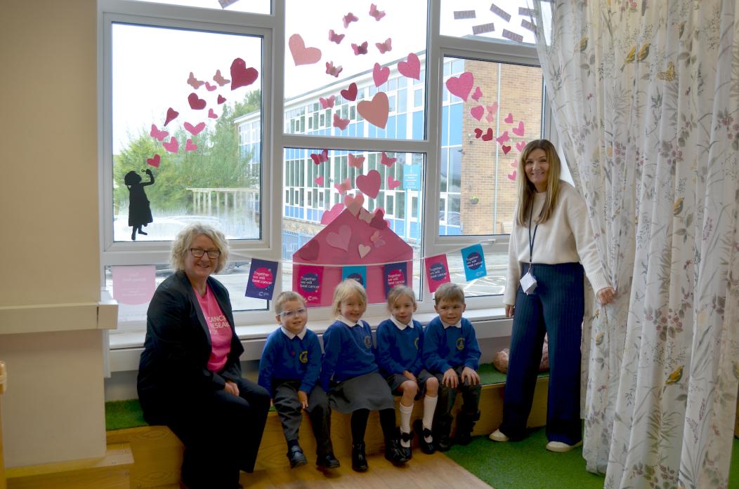 PERFECTLY PINK: Green Lane Primary School reception pupils came up with a creative display for the windows of the classroom.