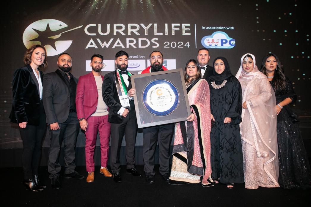 FOUNDER TRIBUTE: Babul's team receive the Curry Legend award from Health and Social Care Secretary, Wes Streeting, in honour of Rafique Babul. His sons, Shuhel and Zak Ahmed are centre