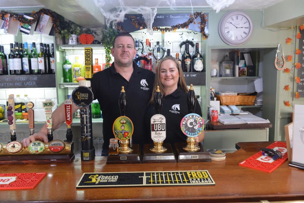 MINE HOSTS: Paul Hauxwell and Helen Richardson are enjoying their time as the new landlords of Ingleton’s Black Horse pub,