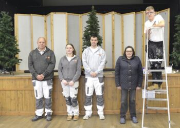 MAKE-OVER: Jeanette Newell of Butterknowle Village Hall with the members of Trades4Care Charlie Wright, Cameron Southworth, Michael Rammage and Ben Woods TM pic