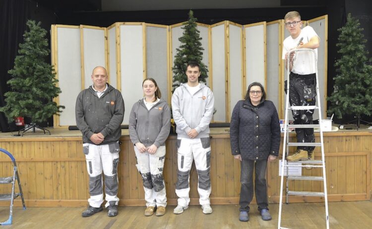 MAKE-OVER: Jeanette Newell of Butterknowle Village Hall with the members of Trades4Care Charlie Wright, Cameron Southworth, Michael Rammage and Ben Woods TM pic