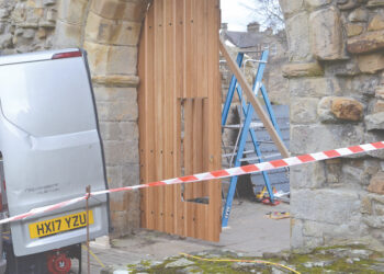 THE entrance to Barnard Castle’s 12th century fortress has been given a face-lift with the installation of new, custom-built oak doors to the north gate. The north gate to the scheduled monument was only a subsidiary gate in the middle ages, but is the main entrance for modern day visitors and staff to the castle. The new hand-crafted oak gates, complete with iron bolts reinstates a useful “wicket gate”, a small doorway within the gate to allow pedestrian access. A spokesperson for English Heritage said: “The wicket gate is similar to the one seen in 18th century engravings and allows the site team to get in and out easily – opening up the main gates to welcome in visitors during opening hours.” The gates being removed from site are a mixture of 19th and 20th century. The lower sections added after archaeological excavations in the sixties removed built-up soil from the entrance. English Heritage received support from Historic England, Raby Estates and Durham County Council for the work.