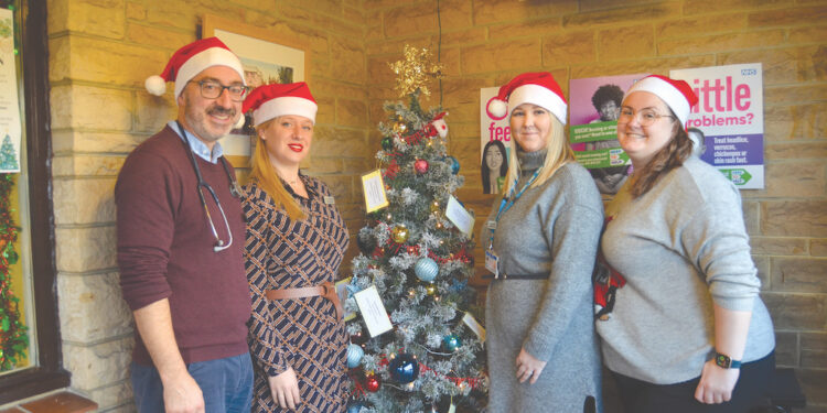 GREAT GIFTS: Old Forge Surgery staff Dr Chris Markwick, Stephanie Markwick, Jade Hetherington and Natalie Mitchell with their community collection gift TM pic