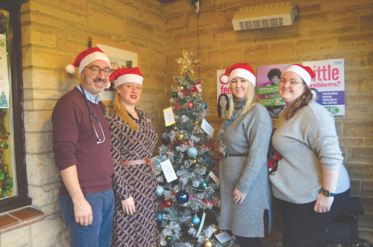 GREAT GIFTS: Old Forge Surgery staff Dr Chris Markwick, Stephanie Markwick, Jade Hetherington and Natalie Mitchell with their community collection gift TM pic
