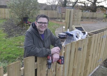 AT THE HELM: Centre manager John Bogle works to put together a picnic table for the wildlife wellbeing garden at the Randolph Centre TM pic