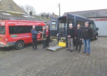 OUT WITH THE OLD, IN WITH THE NEW: Peter Snow, of Vic Young Ltd hands the keys to the community transport bus to Grace Crawford of Utass while Emma Spry (Utass), Cllr James Cosslett (TAP chairman), Adam Robinson (Durham County Council accessibility network planner) and Adam White (TAP co-ordinator) look on TM pic