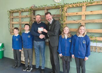 Cllr Adrian Mairs, chairman of Marwood Parish Council, handed over £1,000 to headteacher Rob Goffee and pupils at GReen Lane School towards the cost of developing a nurture hub