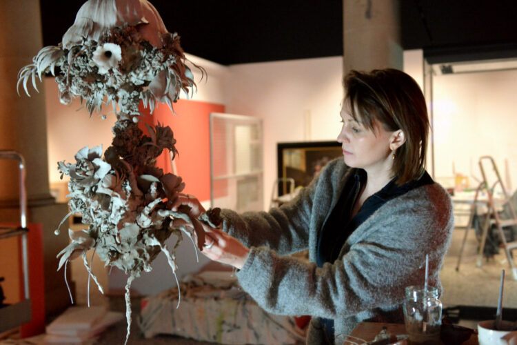 CLAY CREATION: Ceramicist Phoebe Cummings at work on Time Line