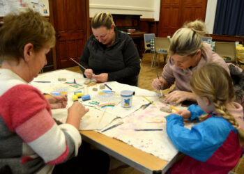 ART FOR ALL: Volunteers and youngsters were enthusiastic during the morning session