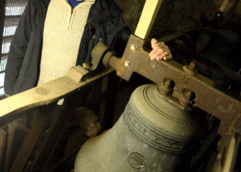 TERRIFIC TONE: Tower captain Mark Palmer with one of the eight bells at Staindrop’s St Mary’s Church which were cast 100 years ago