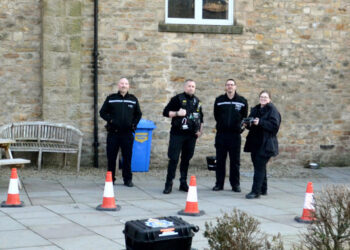 COMING IN TO LAND: A police drone, piloted by PCSO Chloe Gilding, was demonstrated at the final meeting of Teesdale Action Partnership. Watching on are PC Steve Richardson, Sgt Grant Cockerill and Insp Mike Sammut