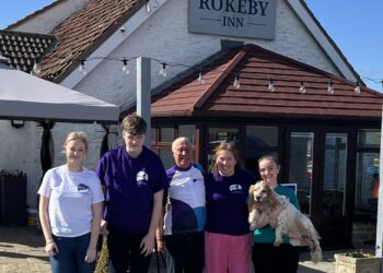 BEST FOOT FORWARD: Grace Harrison, Thomas Bellas, Charles and Lindsey Hall, Ellie Rutterford and Stanley the dog plan to walk 247km this month in aid of Payprus. Not pictured are Izbel Sulleyman, Heidi Witherell and Evie Carter, who are also taking part