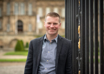 ALL SMILES: Jonathan Wallis has be awarded a Fellowship of the Royal Institution of Chartered Surveyors