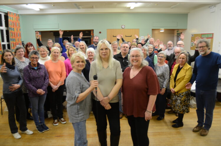 SINGING SUPPORT: Affinity Community Rock Choir leader Jane O’Byrne-West and Claire Jefferies, with Hilary Rabbett, are ready to sing up a storm to raise money to help George