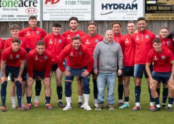 FOOTIE SUPPORT: Adam Morton with the Bishop Auckland Football Club players and officials who donated a portion of their weekly wage towards the 4Louis charity, a charity supporting families with child loss