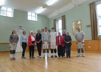 NEW LOOK: Students Matthew Walker and Michael Rammage, Trades4Care officers Charlie Wright and Cameron Southworth and village hall members Elizabeth Cowell, Tereasa Wilcox, Jean Ambrose, Dreda Forster and Pippa Leach