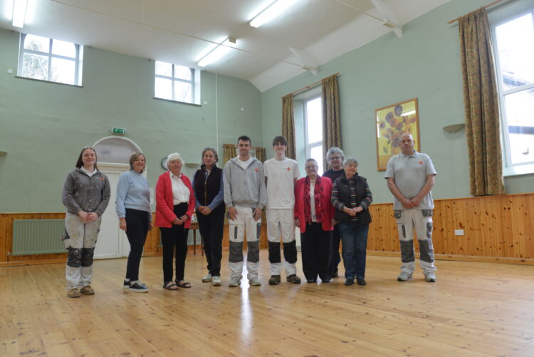 NEW LOOK: Students Matthew Walker and Michael Rammage, Trades4Care officers Charlie Wright and Cameron Southworth and village hall members Elizabeth Cowell, Tereasa Wilcox, Jean Ambrose, Dreda Forster and Pippa Leach
